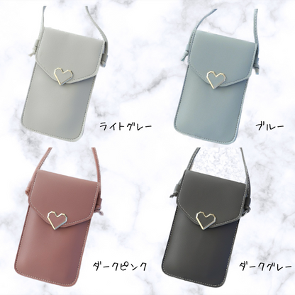 Soar ｜可愛いハートチャームのスマホショルダーポーチ｜ ソア ポーチ スマホ ポシェット ショルダー ストラップ バッグ ミニバック 小物入れ スマホポーチ 肩掛け 可愛い 上品 高見え 便利 持ち運び ショッピング ブランド レディース おしゃれ 携帯 iPhone15 アイフォン 斜めがけ かわいい スマホ ハート ゴールド